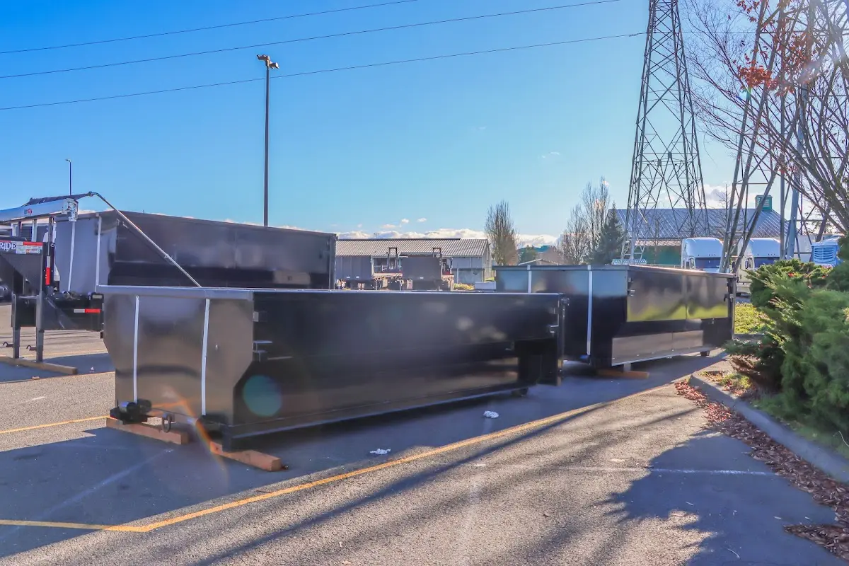 Roll-off dumpster ready for waste disposal at job site for Construction Dumpster Rental in Concord